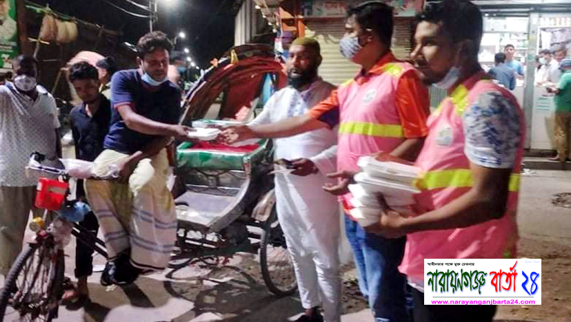 মানবিক সংগঠন “ টিম খোরশেদ ” এর খাবার বিতরণ
